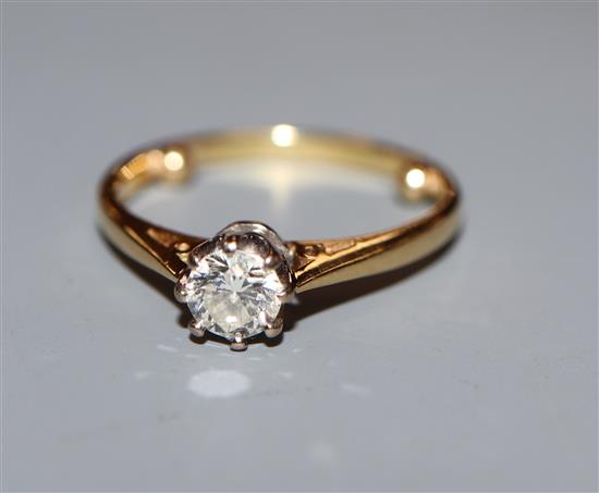 An 18ct gold and solitaire diamond ring, size H.